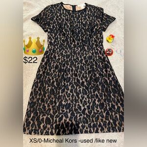 Size 0, Michael Kors mini dress, never worn, new without tag.